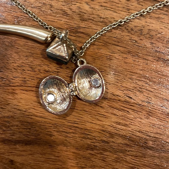 J Crew gold colored multi charm necklace with locket, obelisk and horn - Picture 3 of 4